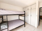 Recámara con litera doble y closets, Alejandría Residencial
