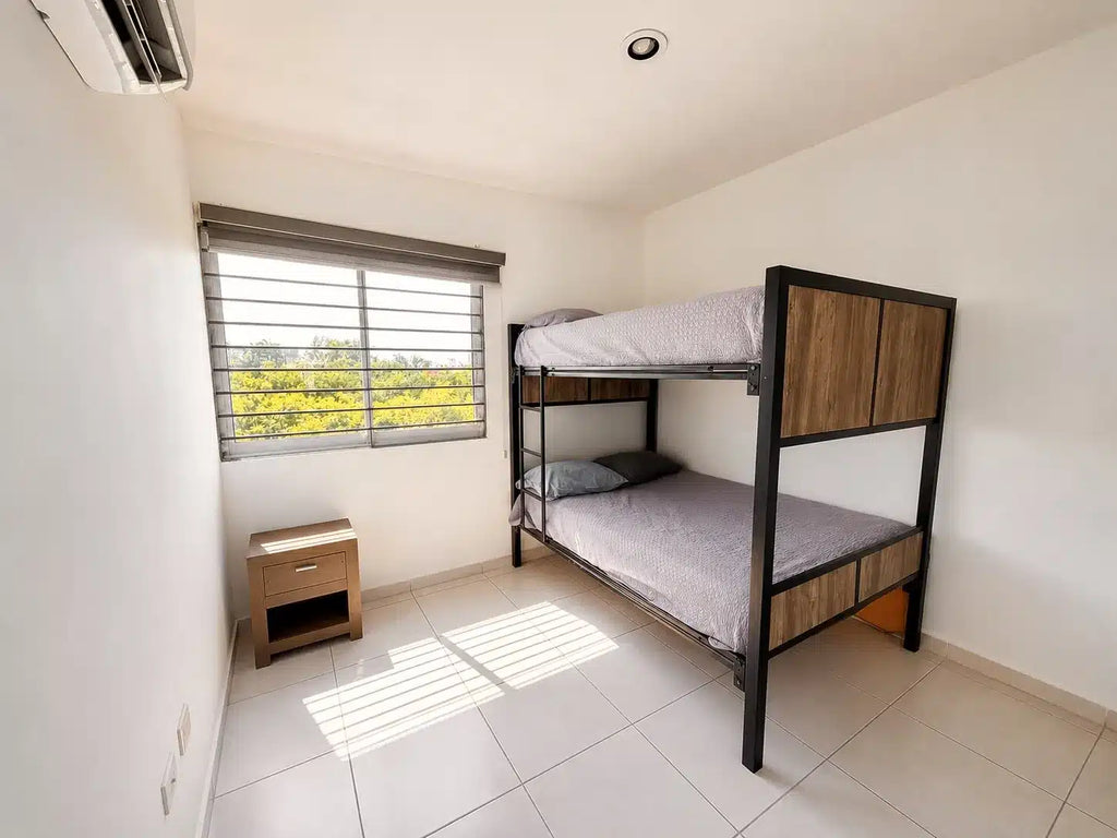 Recámara con litera individual, departamento Mazatlán