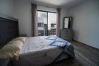 Recámara secundaria con luz natural en departamento en venta en Playa Sur