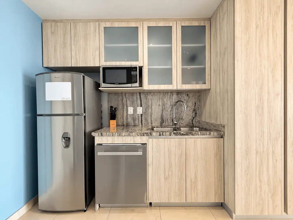 Cocina integral con barra departamento venta Sunset View Mazatlán
