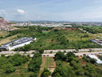 Vista aérea de terrenos y vialidad en la zona norte de Mazatlán, cerca de Marina Universidad